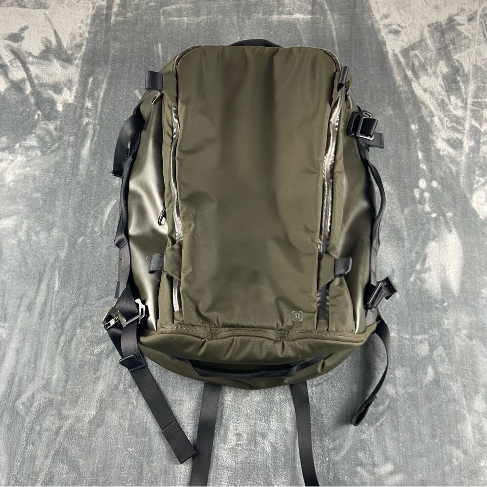 Lululemon More Miles backpack 39L Olive Green Orange Laptop Compartment